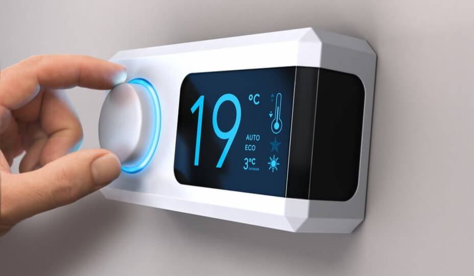 thermostat au mur indiquant 19° celcius