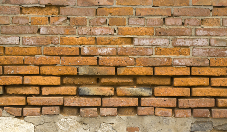 damaged-brick-wall