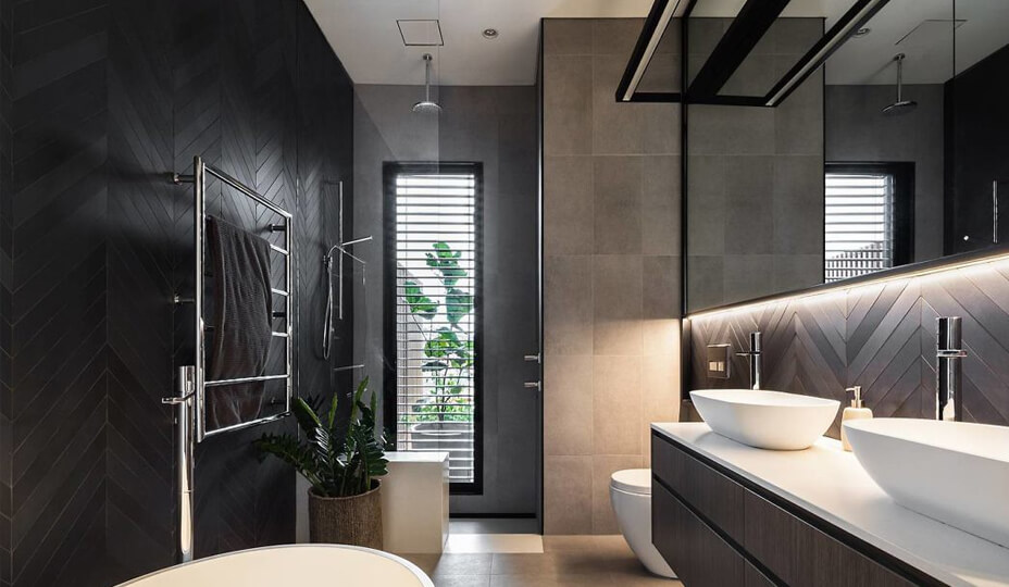 bathroom-with-matte-black-herringbone-tiles