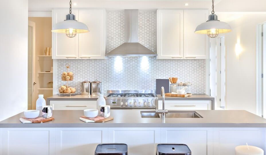 Ambient and task lighting in a bright white kitchen