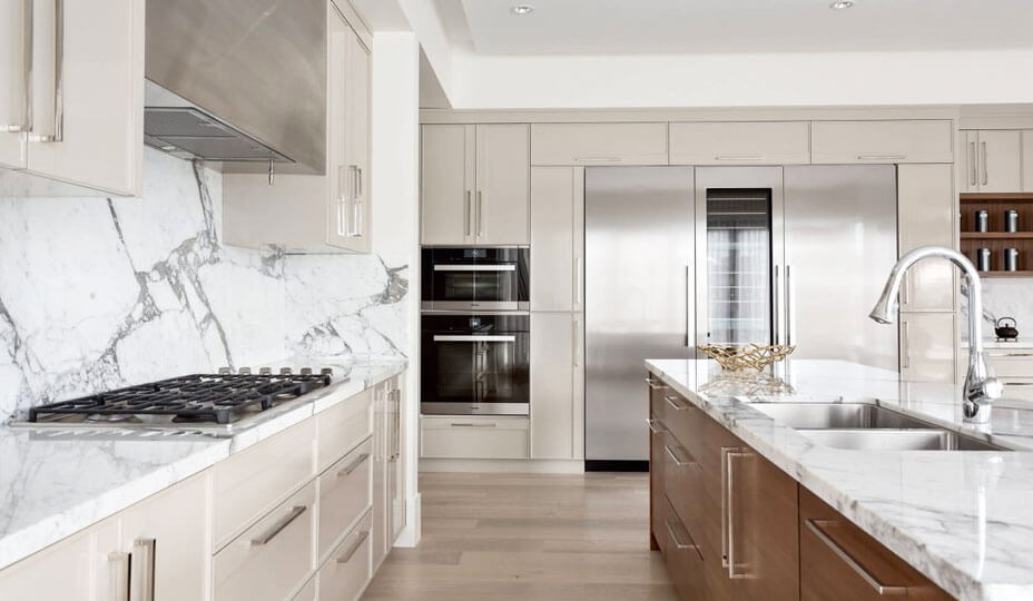modern kitchen with beige cabinets