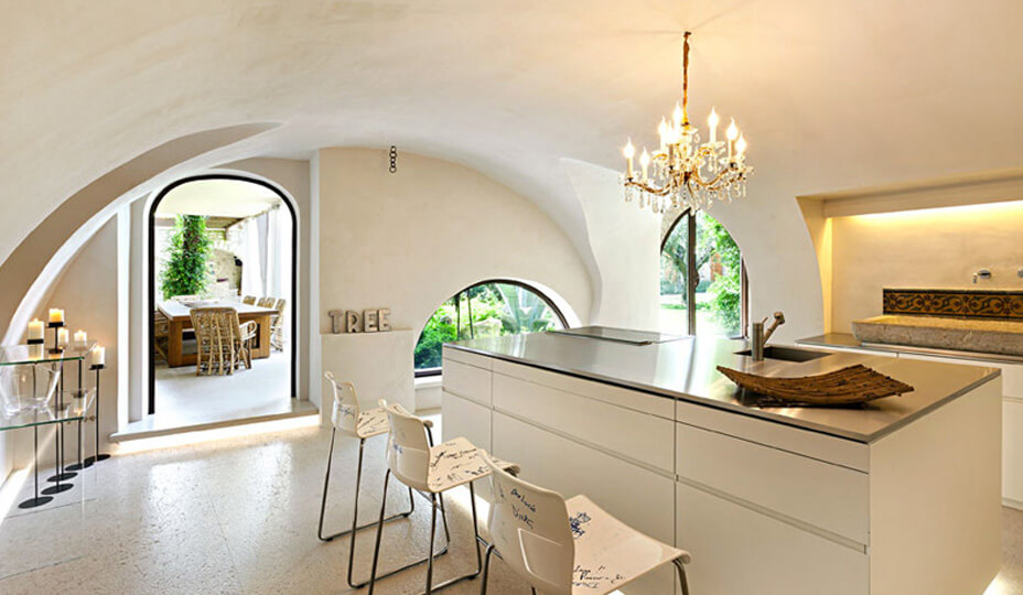 spanish style kitchen with rounded ceiling
