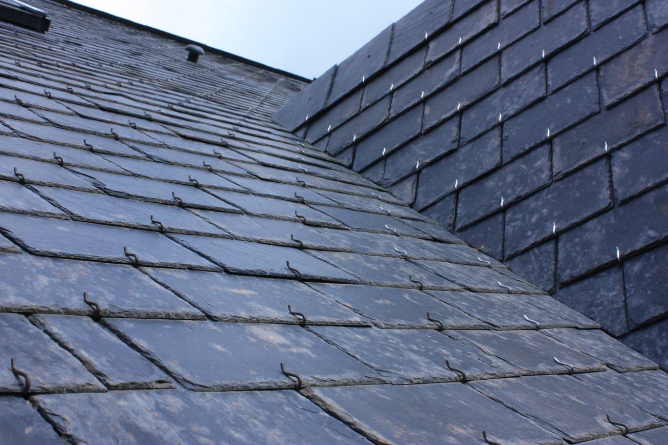 Close-up of slate tiles on a sloped roof