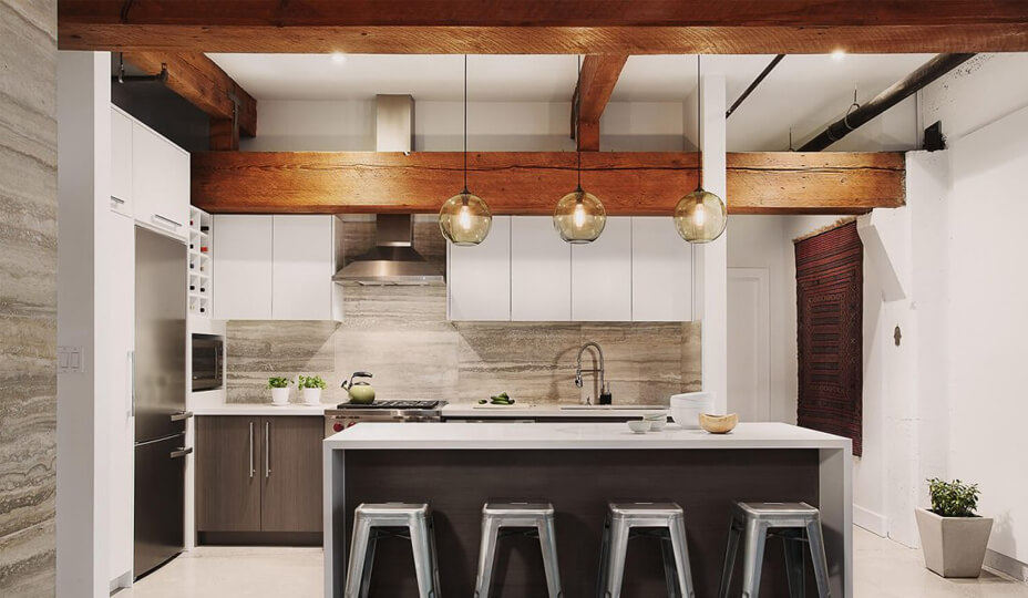 industrial kitchen with wooden ceiling beam