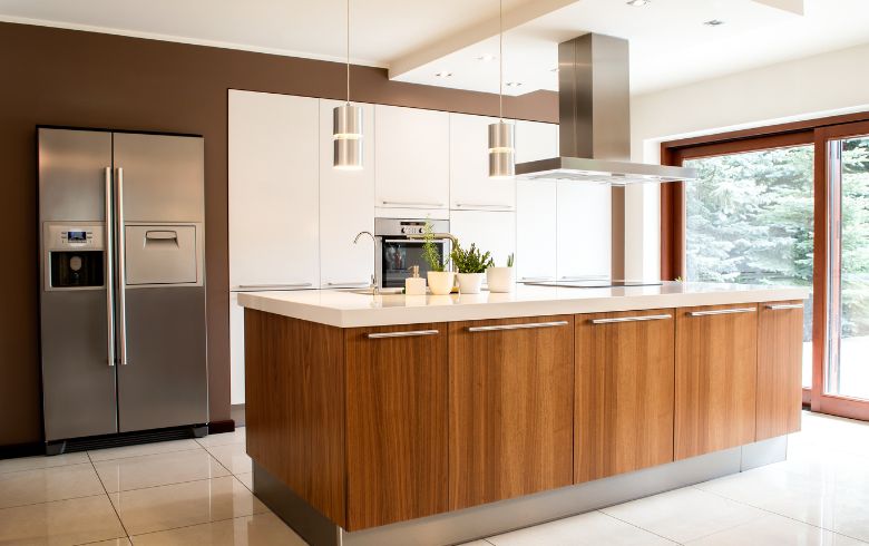 two-tone one-wall layout with white cabinets and wood island