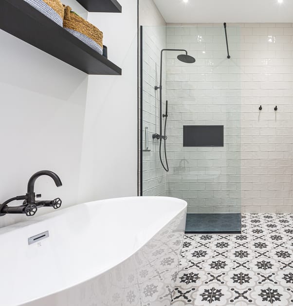 Modern black and white bathroom with patterned tiles