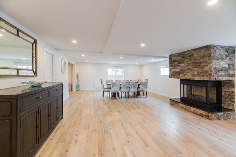 Large basement with dining area and wooden floors