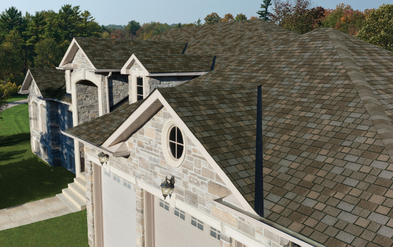 grey asphalt roofing shingles on an American style house