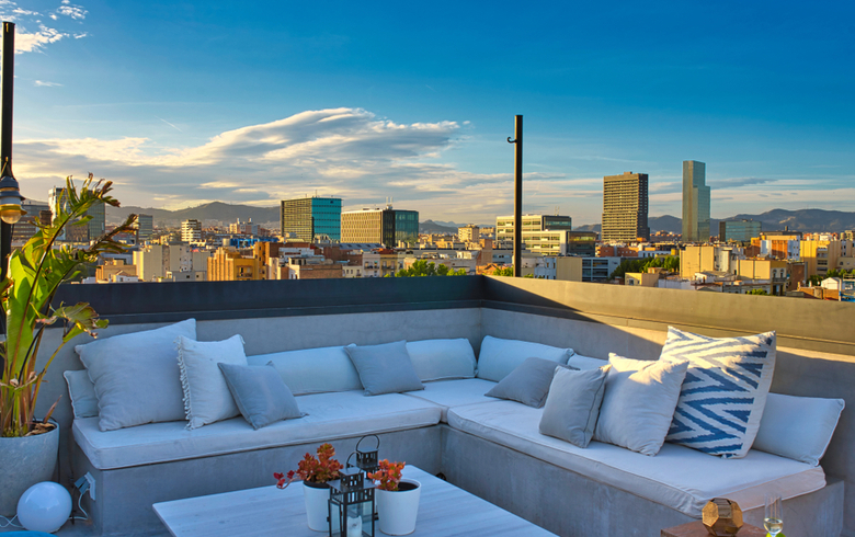 rooftop terrace with a view of a metropolitan city