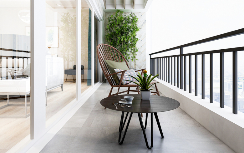 light-coloured balcony with modern, minimalist outdoor furniture