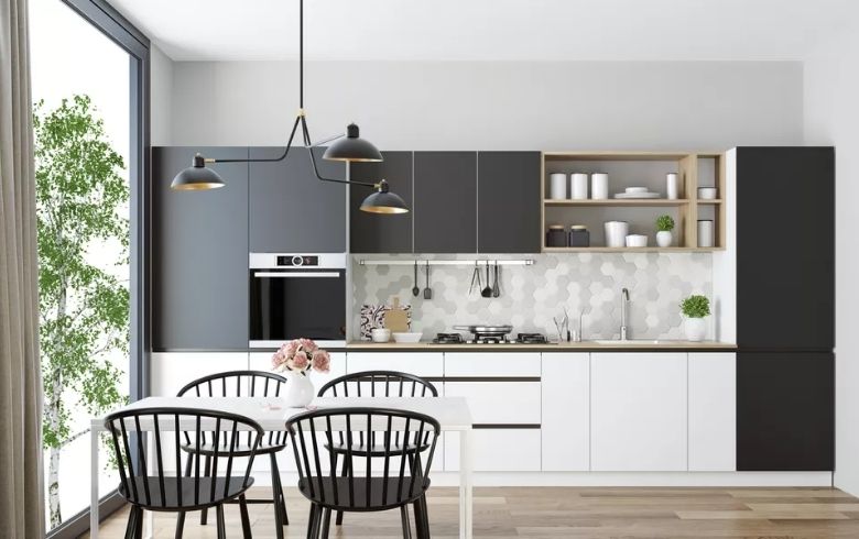 clean modern kitchen in a one wall layout with black slab cabinets