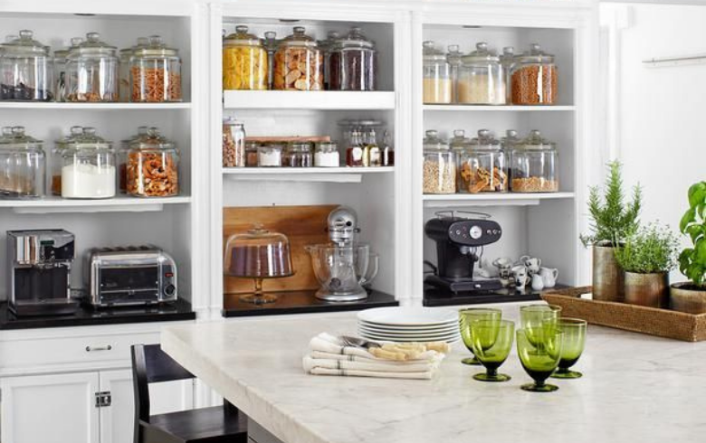 exposed pantry in classic white kitchen and decanted items