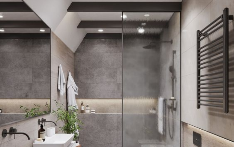 Grey tiled walk-in shower with pot lights