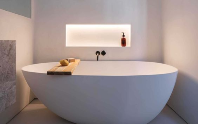 freestanding tub with lit alcove