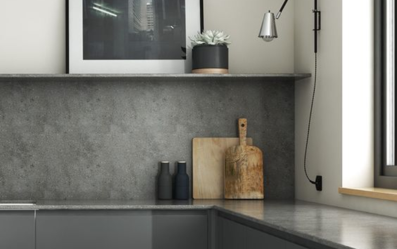Grey stone laminate backsplash in grey kitchen