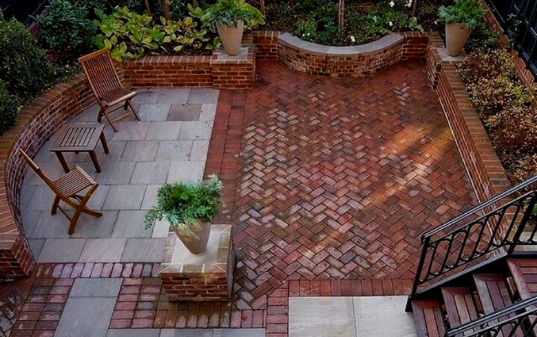 backyard patio detailed with recycled red brick