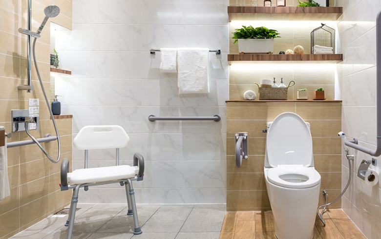wheelchair accessible wet room style bathroom with white and beige tiles