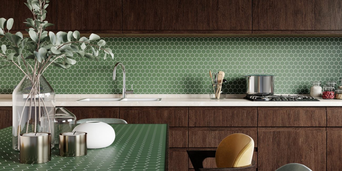 Kitchen with table and worktop and green backsplash