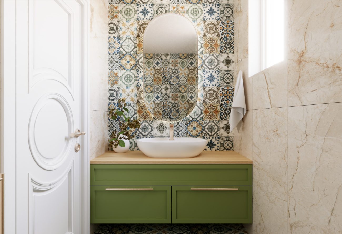 Bathroom with colorful cement tiles backsplah, green vanity and wooden counters