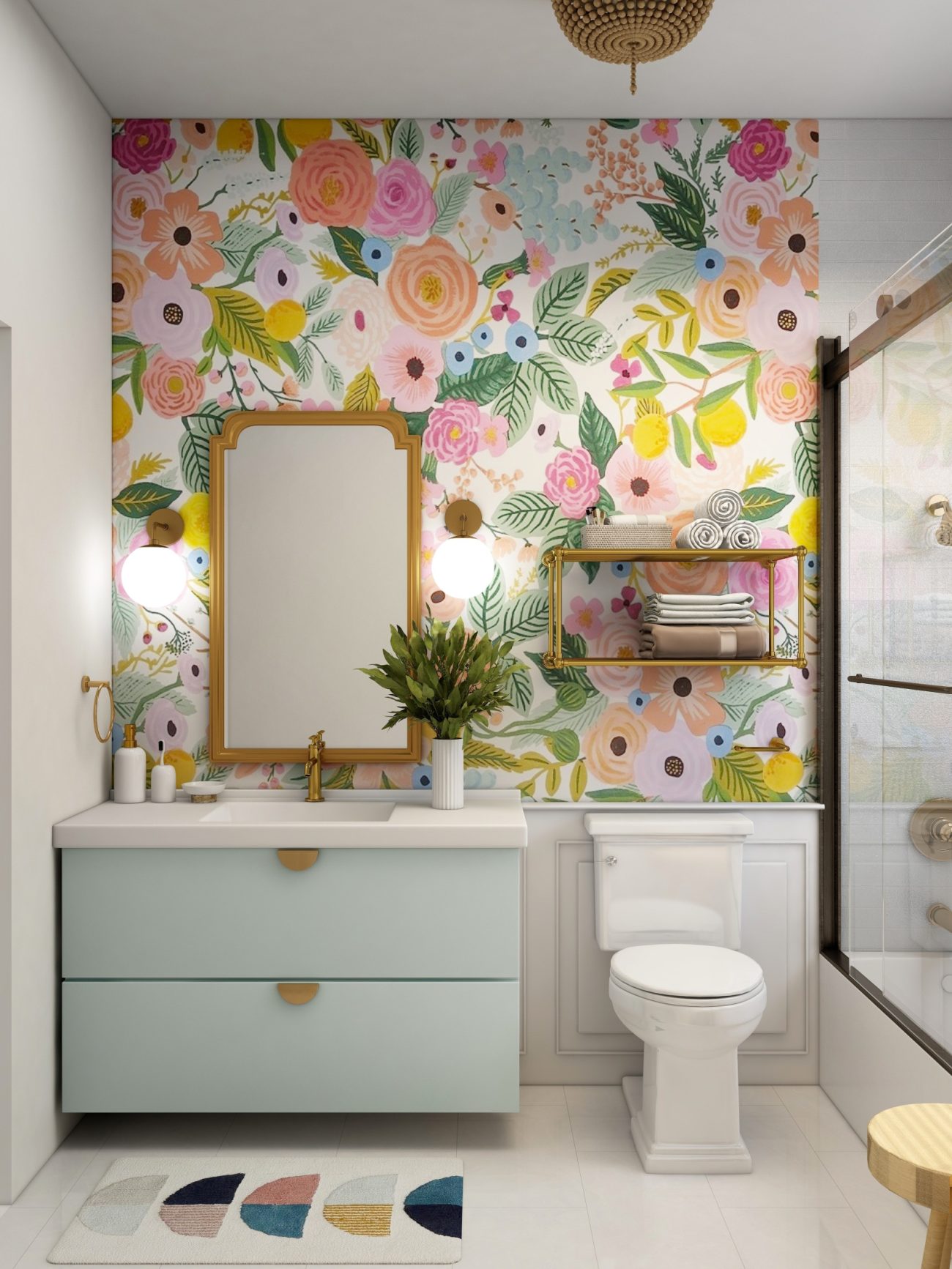 Bathroom with floral wallpaper, light green vanity and rectangular gold mirror