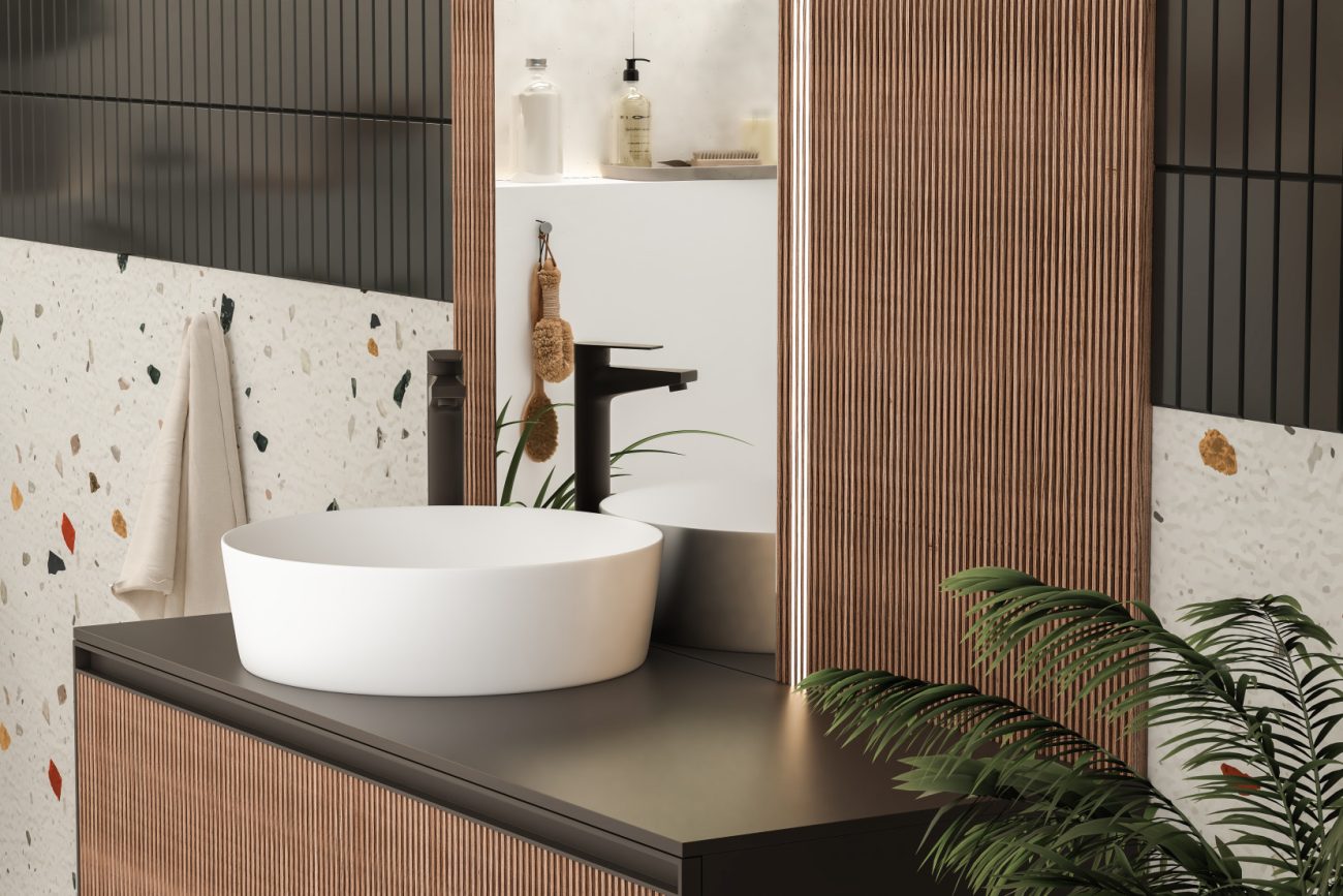 Bathroom with wooden backsplash, white vessel sink and terrazzo wall