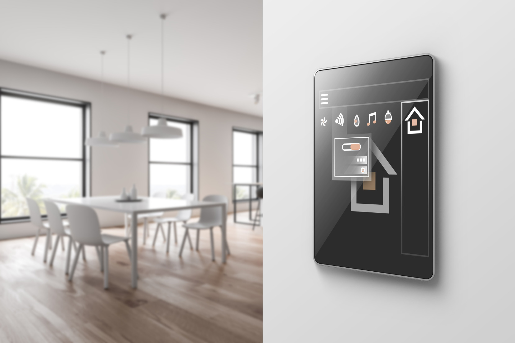 Close up of smart home system that controls lights, temperature, alarms, and more in a new home construction.