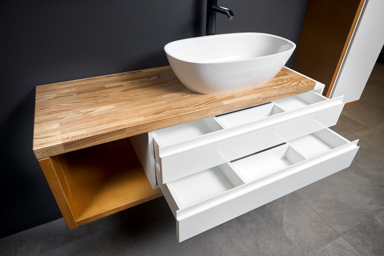 Bathroom cabinet with sliding drawer organizers