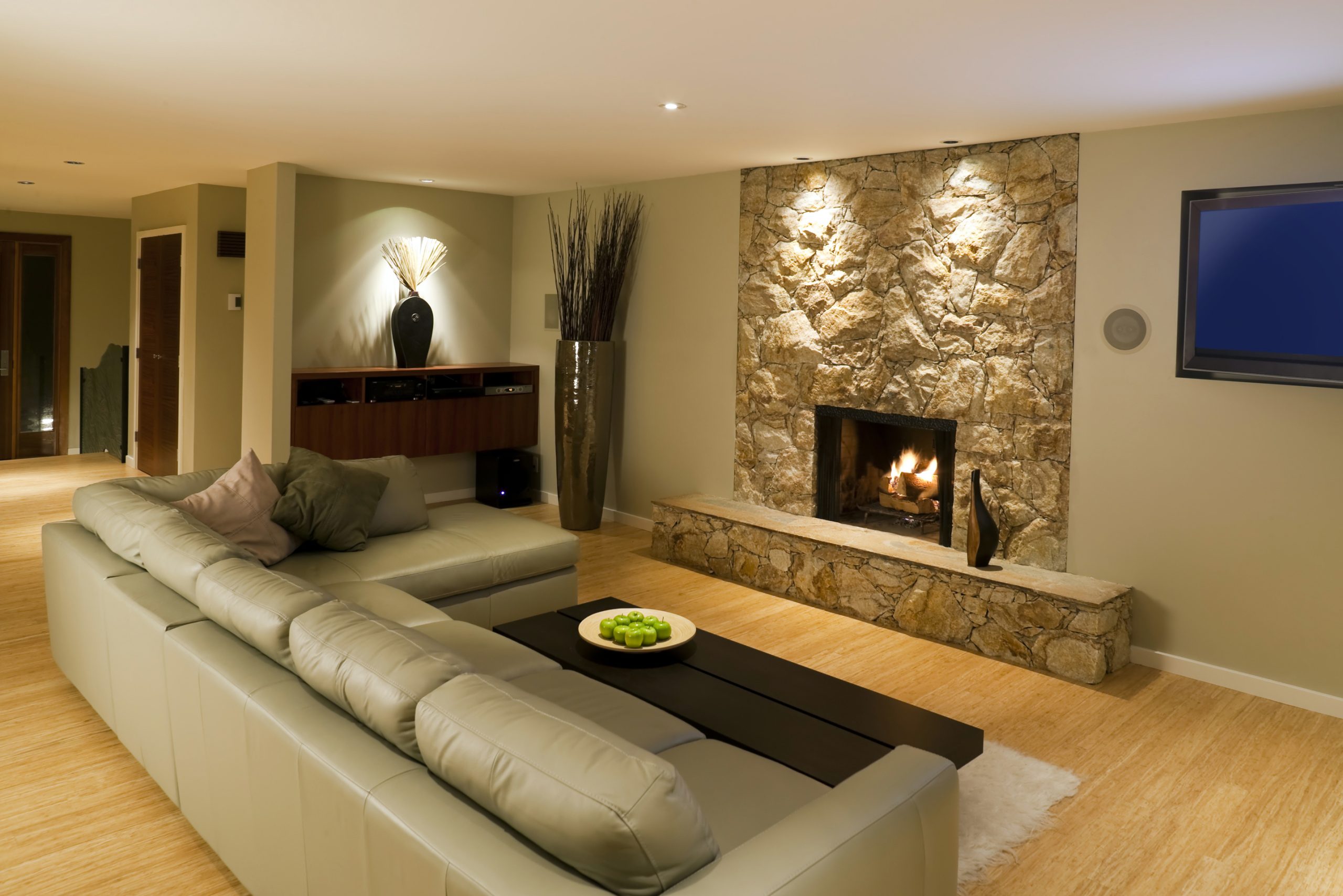 Basement living room with vinyl roll flooring